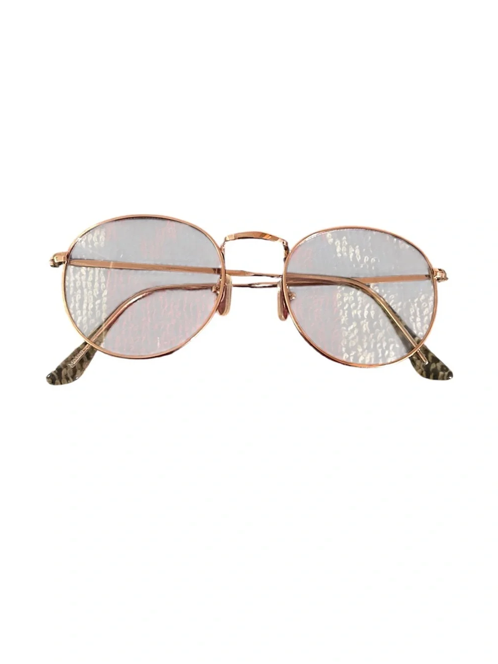 Unisex Rose Gold Round Metal Frame. The glass can be changed to prescription